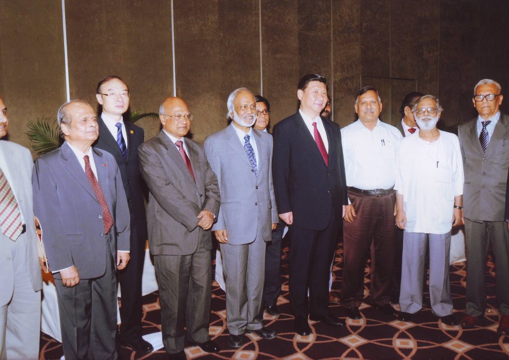 BCFC President Delwar Hossain standing beside President Xi Jinping of China with other friends